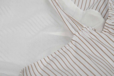 brown and white garment